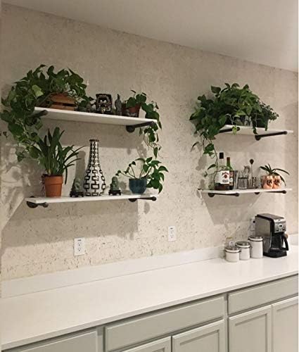 industrial black iron pipe shelf brackets 10 inch shown in use