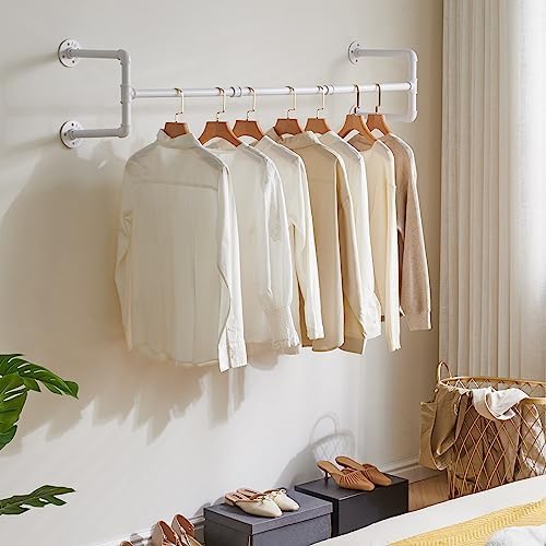 ibuyke 50" industrial pipe clothes rack wall mounted shown in use