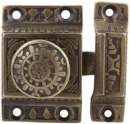 a29 cabinet latch, solid brass, windsor design, set shown in use
