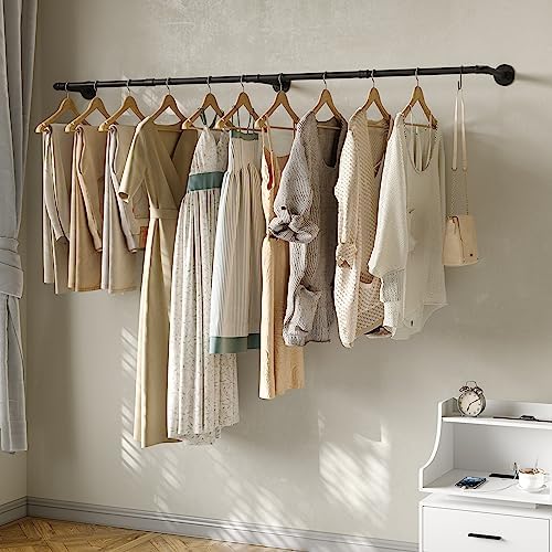 industrial pipe clothes rack with 3 s-shaped hooks shown in use