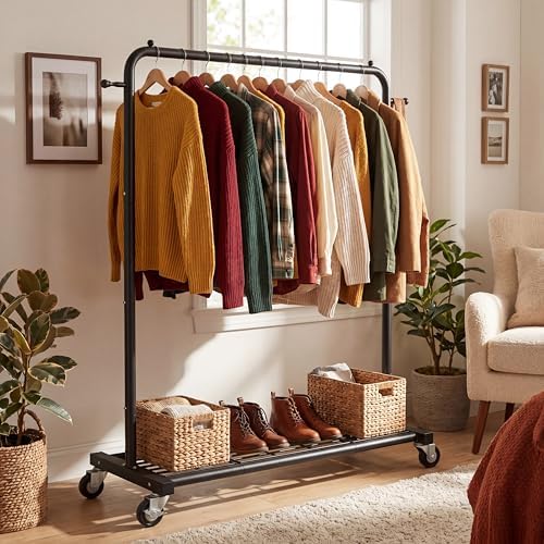 sywhitta metal clothing rack on wheels with mesh shown in use