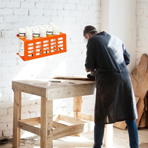 metal wall mount caulking tube holder rack, orange on a desk or shelf