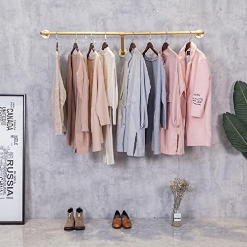 industrial pipe wall mounted clothes hanging shelves system,metal, close-up detail