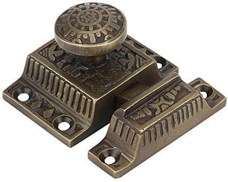 a29 cabinet latch, solid brass, windsor design, set on a desk or shelf