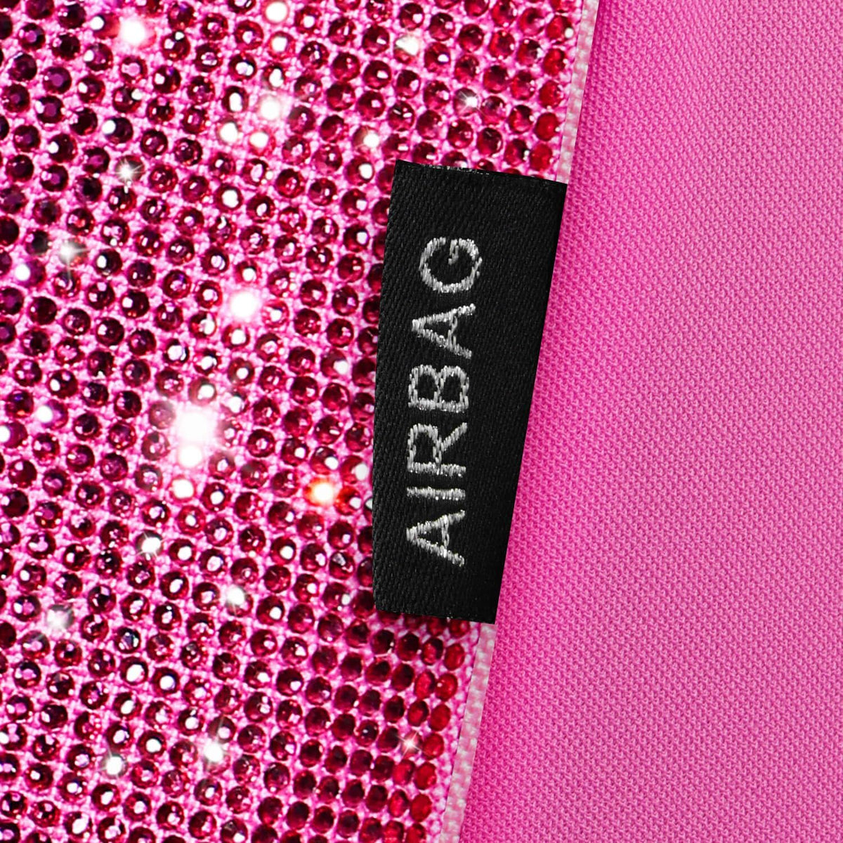 car pass hot pink bling diamond leather car, front angle view