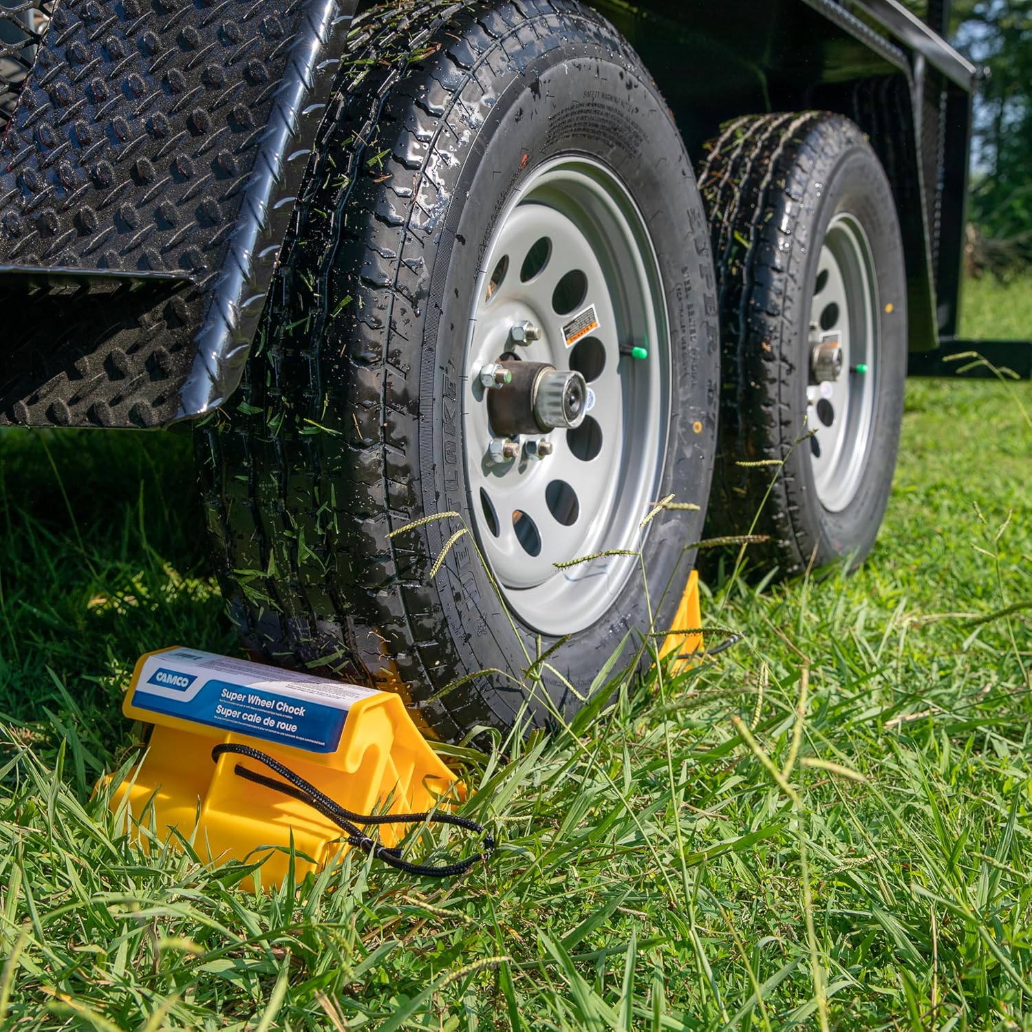 Camco Super Wheel Chock w/Rope - Large, Heavy Duty Trailer Wheel Chock Constructed of Durable Plastic - Features Rope Handle for Easy Removal - Use w/Tires Up to 29-inches – 44475