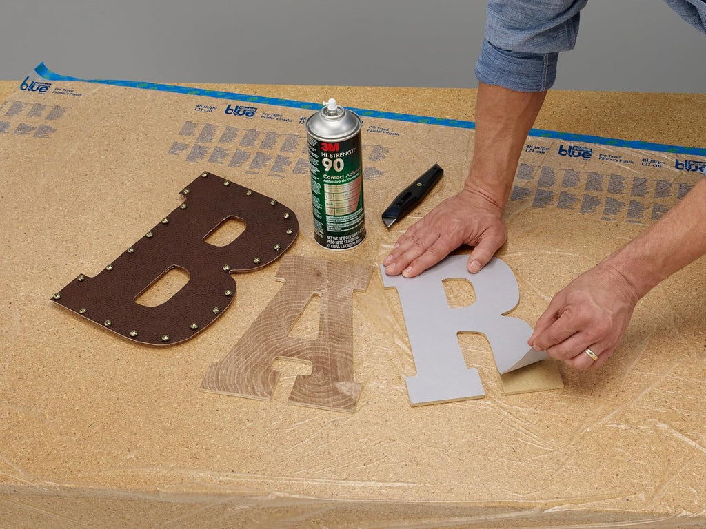 3m hi-strength spray adhesive 90, 14.6 oz., industrial on a desk or shelf